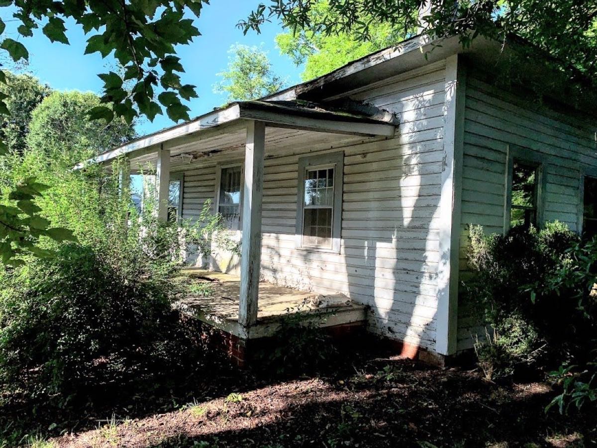 House purchased as-is on Shinnville Rd in Mooresville, NC
